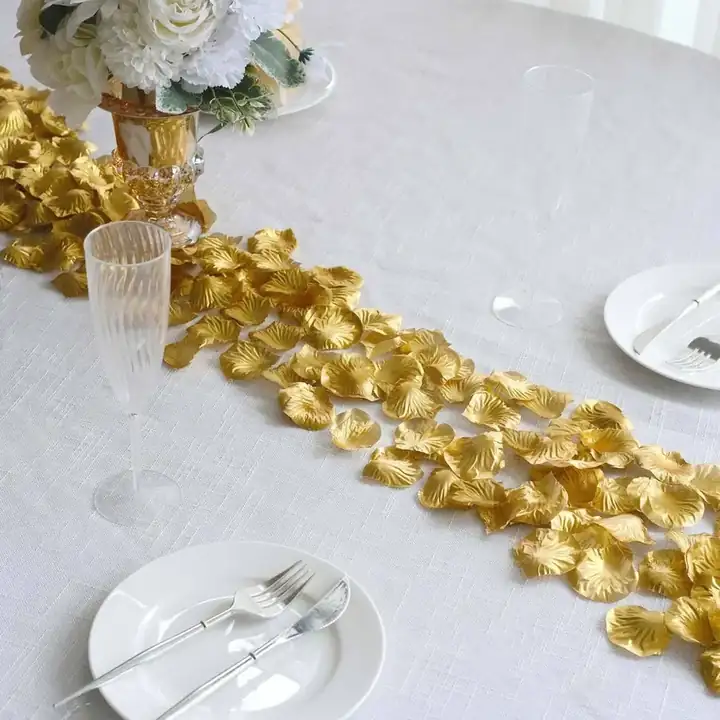 Gold petals on a white table